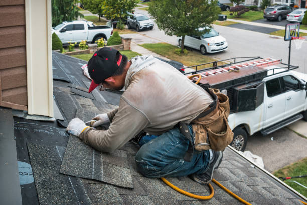 Professional Flat Roof Repair technician working in Highlands, TX